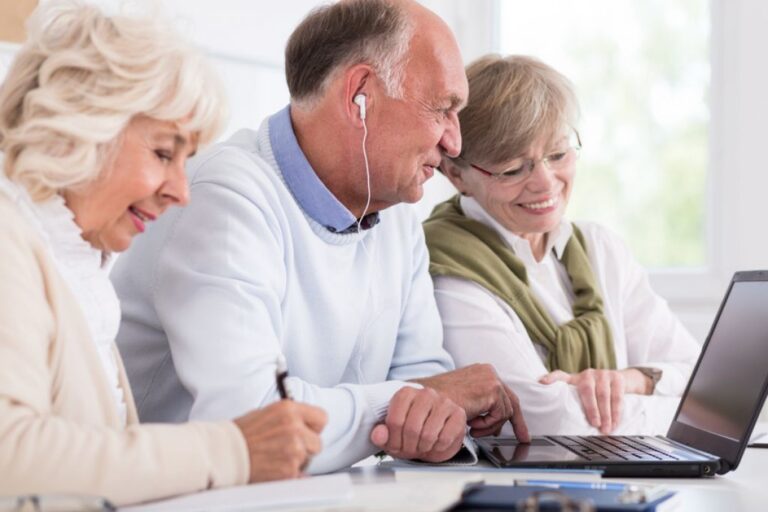 Seniors Enjoying Working on a Computer